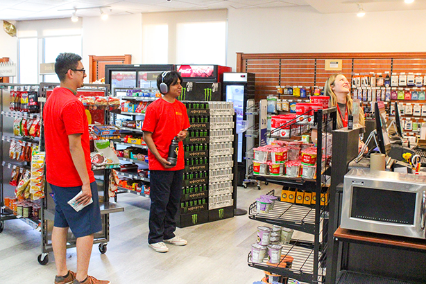 Students standing in the checkout lane in bookstore