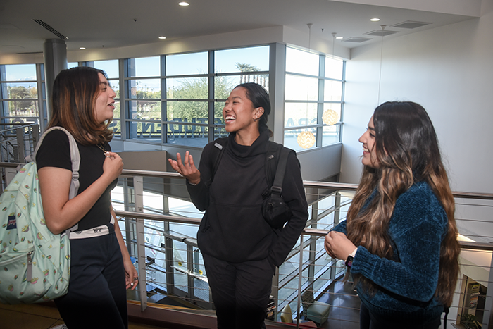 Students talking about Financial Aid